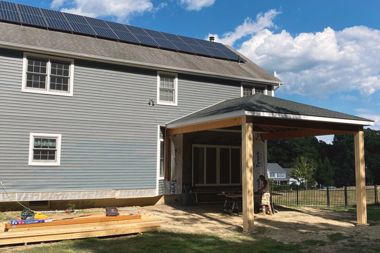 Elegant Outdoor Patio Addition Framing progress roof support structure