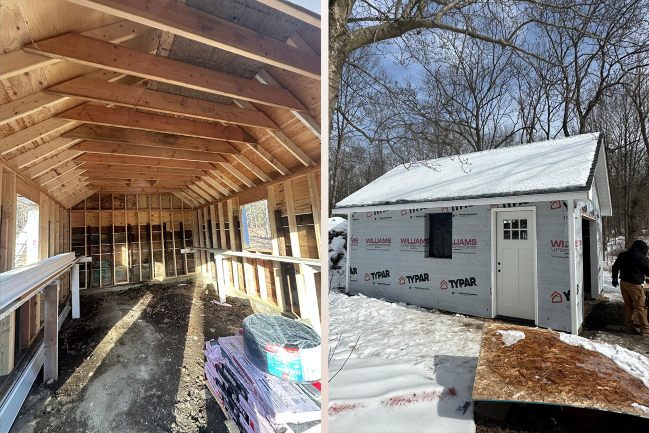 Interior view of the garage during construction, showcasing the roof framing, exposed wooden beams, and the foundation with construction materials placed along the walls. Exterior of the nearly completed garage, showing the finished roof, a door installation, and snow covering the ground