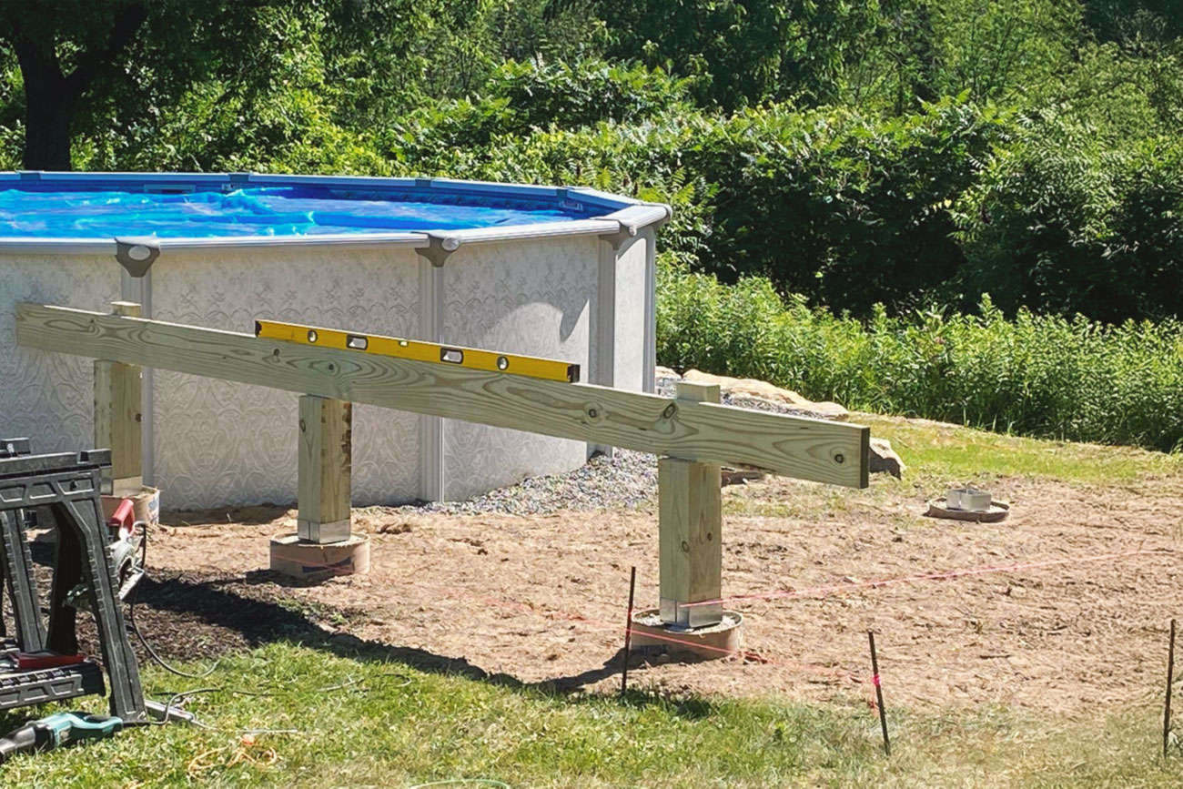 Beams and posts being installed for the pool deck structure